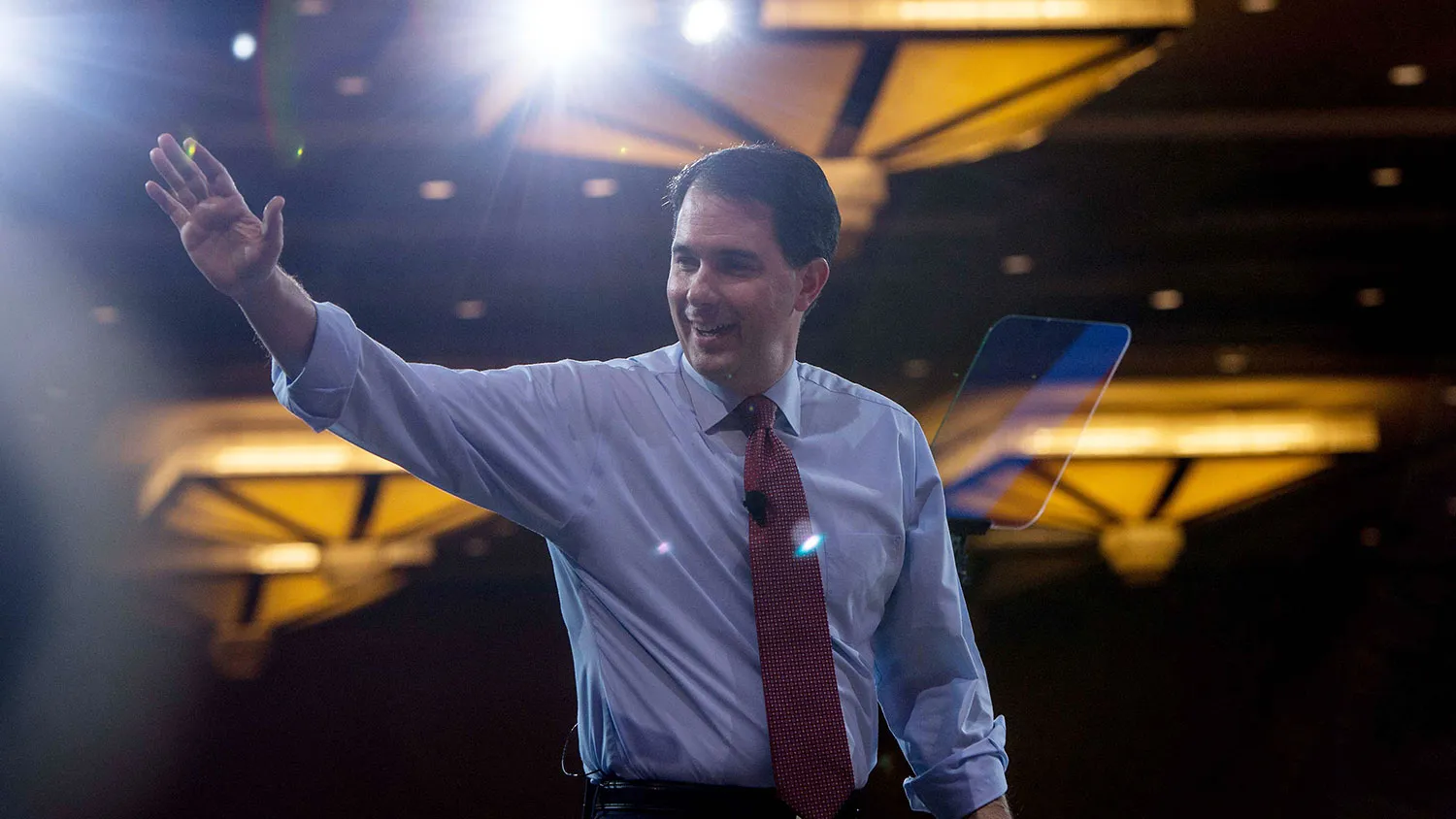 Wisconsin Governor Scott Walker walks off stage after speaking at the annual Conservative Political Action Conference (CPAC) at National Harbor, Maryland, outside Washington, DC on February 26, 2015.
