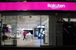 A Rakuten Mobile Inc. employee works inside the company's store in Tokyo, Japan.