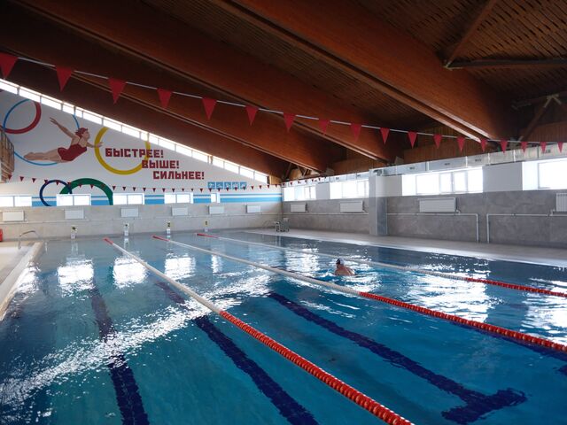A swimming pool at compound in Barentsburg. Barentsburg is a company town owned and managed by Trust Arktikugol, a Russian state-backed entity, which provides a school, shop, library, Orthodox church, canteen, sports and entertainment facilities, as well as a hotel and brewery for curious tourists. 