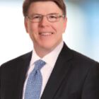 Headshot of Christopher J Policinski "Chris"