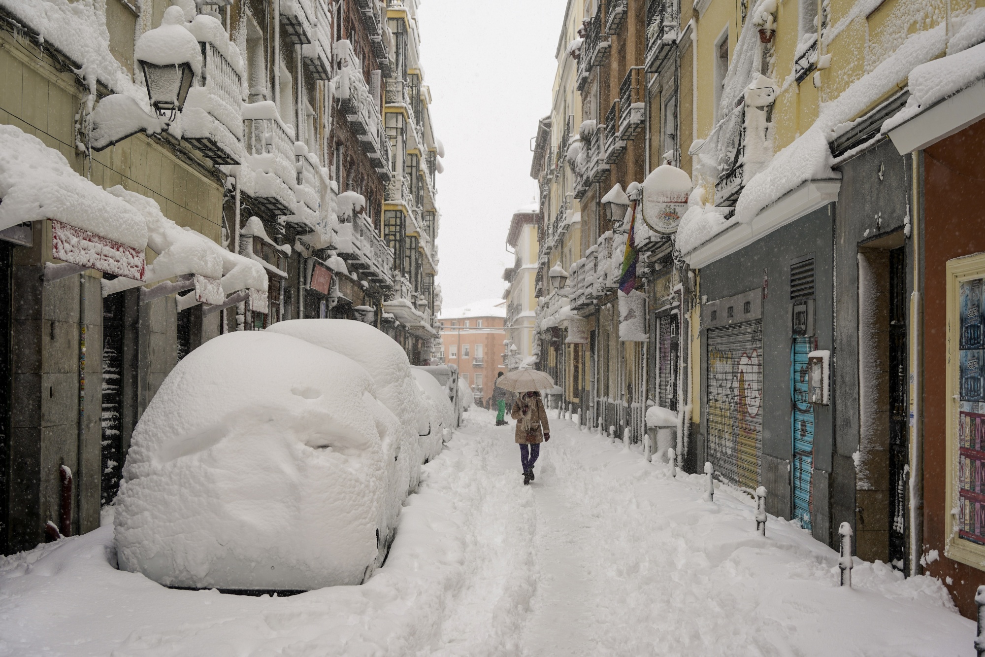 Heavy snowfall covers cars parked in&nbsp;Madrid,&nbsp;Jan. 9.