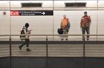 A commuter in the Second Avenue subway station in New York.