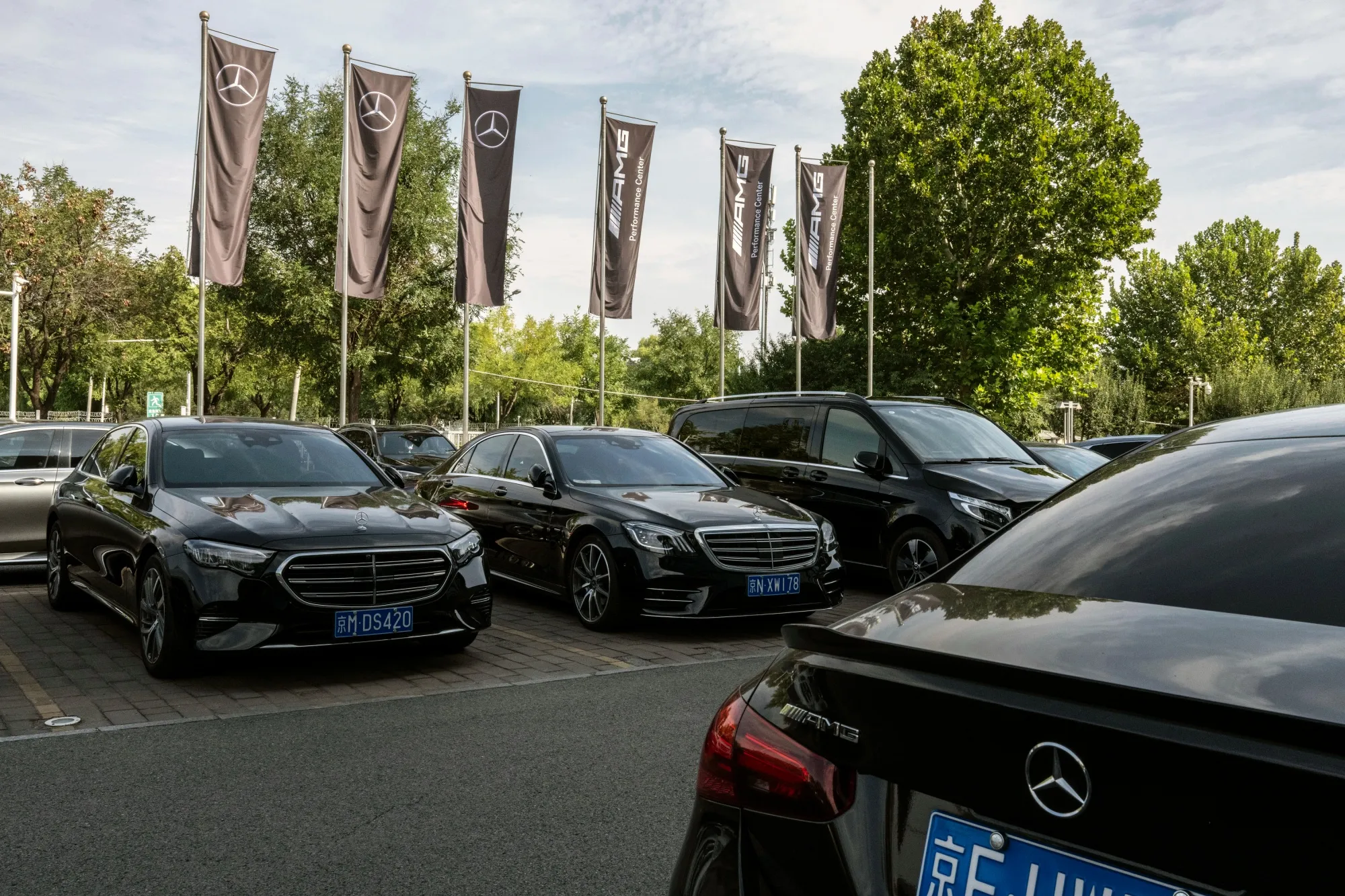 Vehicles at a Mercedes-Benz Group AG dealership in Beijing.