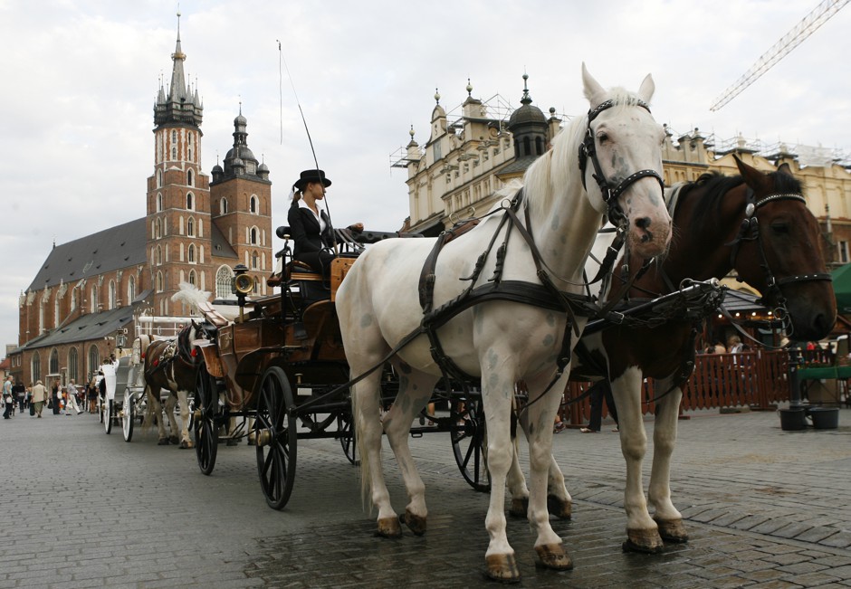 Carriages in the Market Square, Krakow, a city whose popularity with tourists belies a longstanding pollution problem.