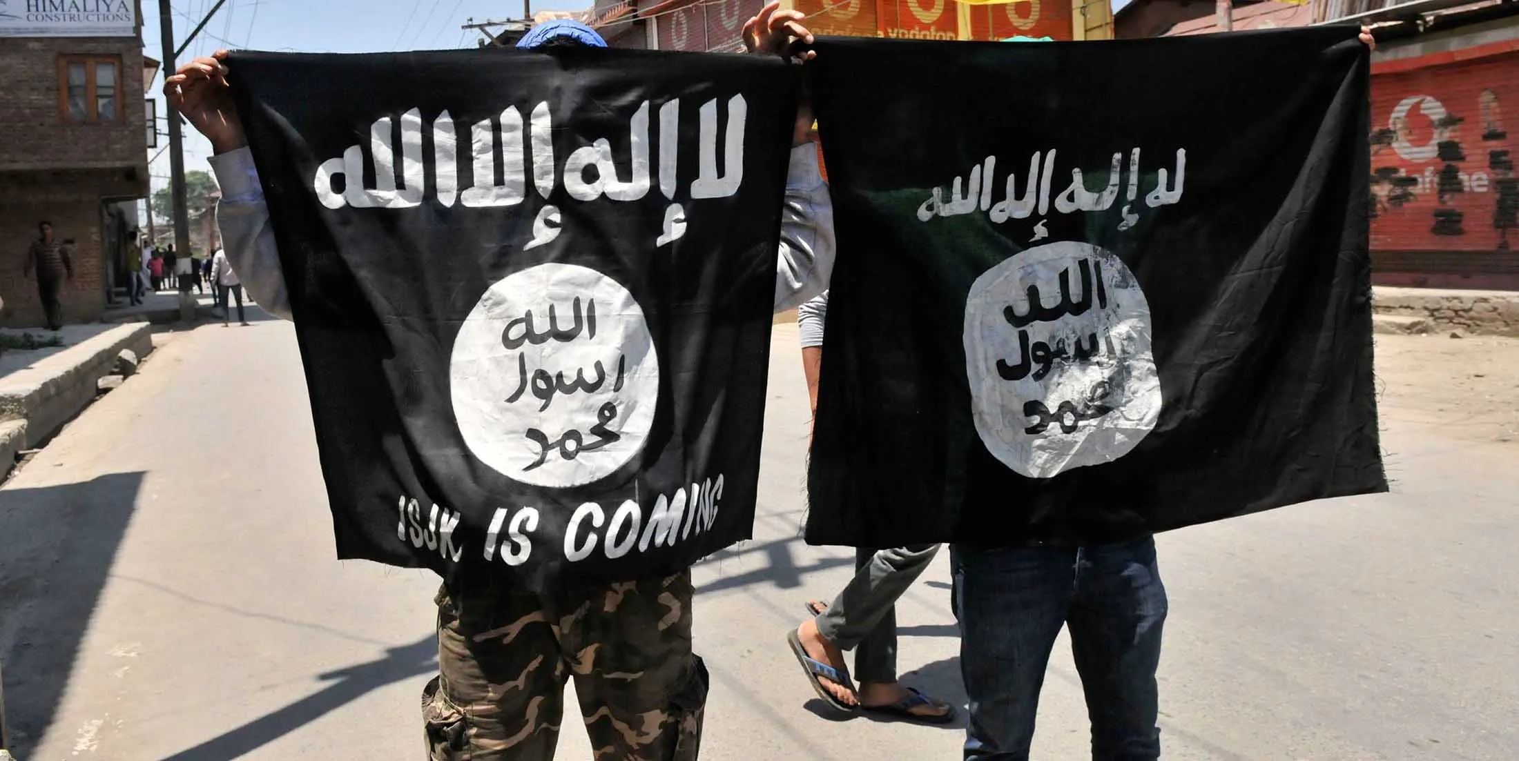Kashmiri protesters displaying the flags of ISIS during a protest against alleged desecration of Jamia Masjid by police personnel yesterday after Friday prayers, on June 27, 2015 in Srinagar, India.
