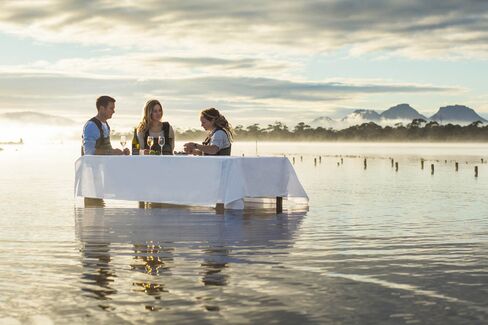 Eating oysters, moments after they've been plucked from the sea.
