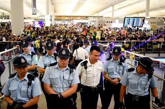 Airport Cleans Up After Night of Protest Chaos: Hong Kong Update