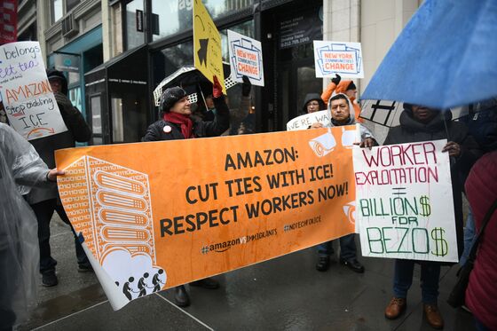 Amazon Critics Rally at Bezos NYC Penthouse for Cyber Monday