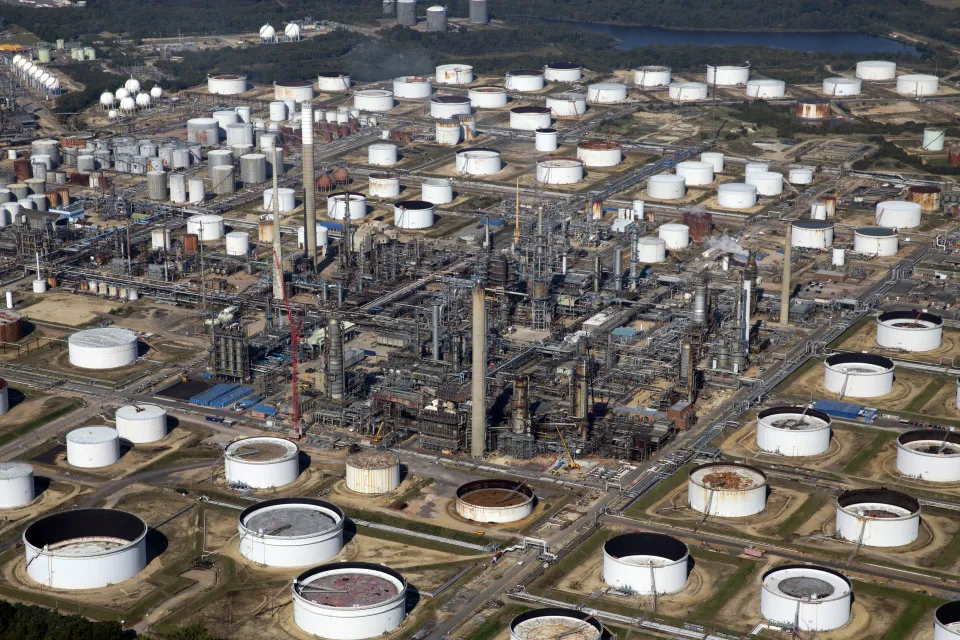 Oil storage tanks and refining facilities at an Exxon Mobil refinery.