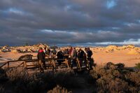 A guided tour at the Walls of China viewing platform in Mungo National Park in New South Wales, Australia, in July 2020.