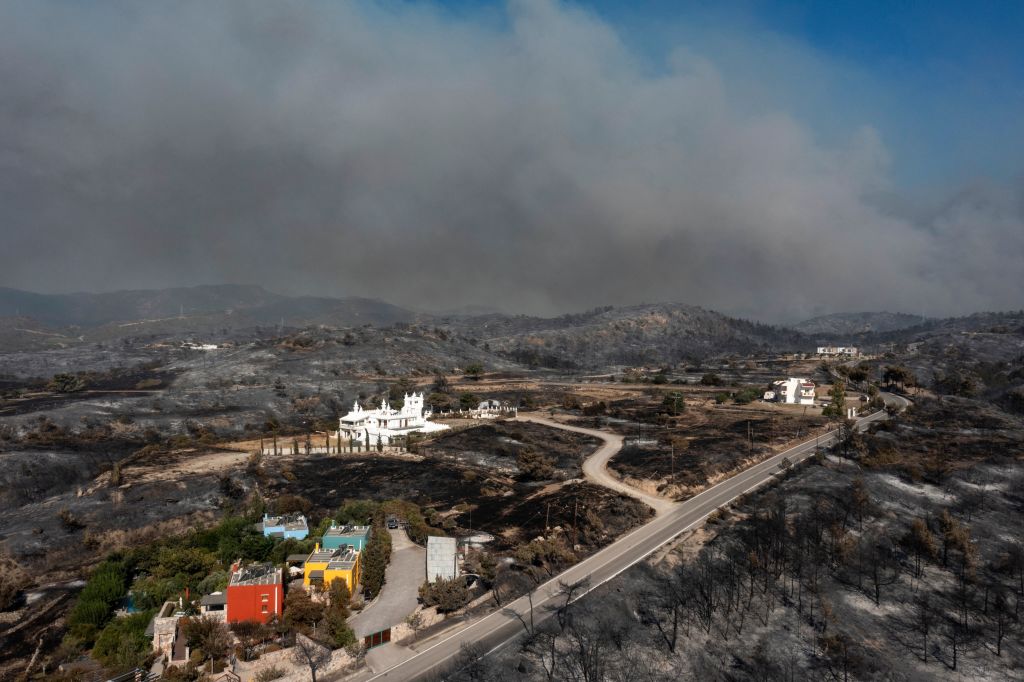 Smoke billowing near Kiotari village, on Rhodes on July 24.