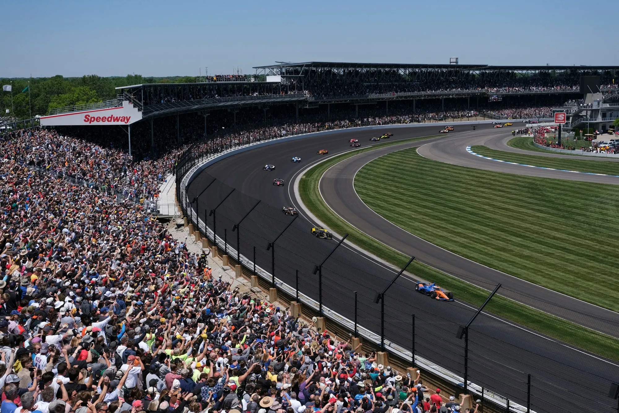 Spectators cheer during the Indianapolis 500.