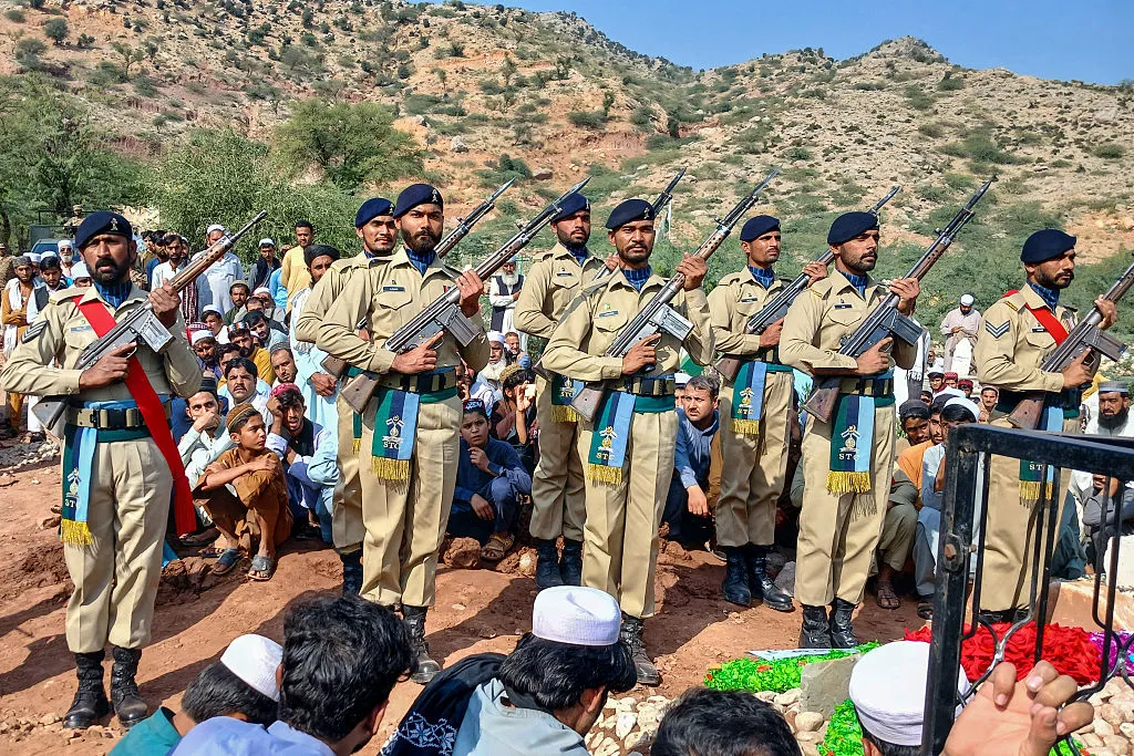 Pakistan ceremonial guards perform during a funeral ceremony of a paramilitary personnel killed during the Afghanistan-Pakistan border clashes, in Kohat on Oct. 17.