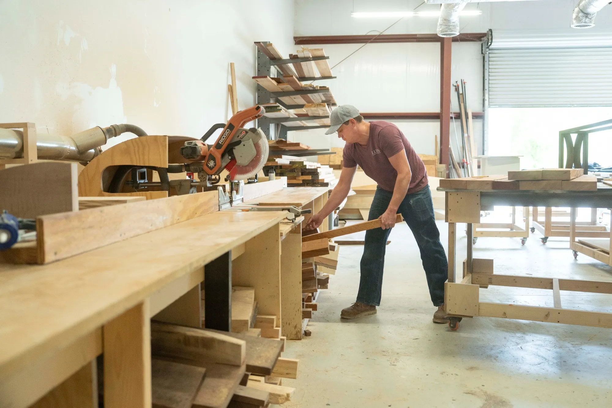 A worker builds furniture at a production facility in Wilmington, North Carolina.