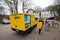A Deutsche Post employee uses a StreetScooter to make a postal delivery in Hamburg, Germany.