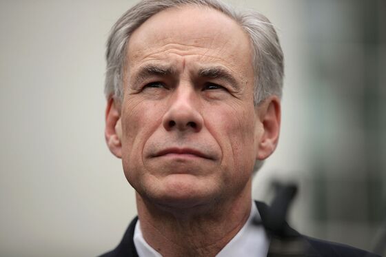 Texas Governor Says Positive-Rate Surge Under Investigation