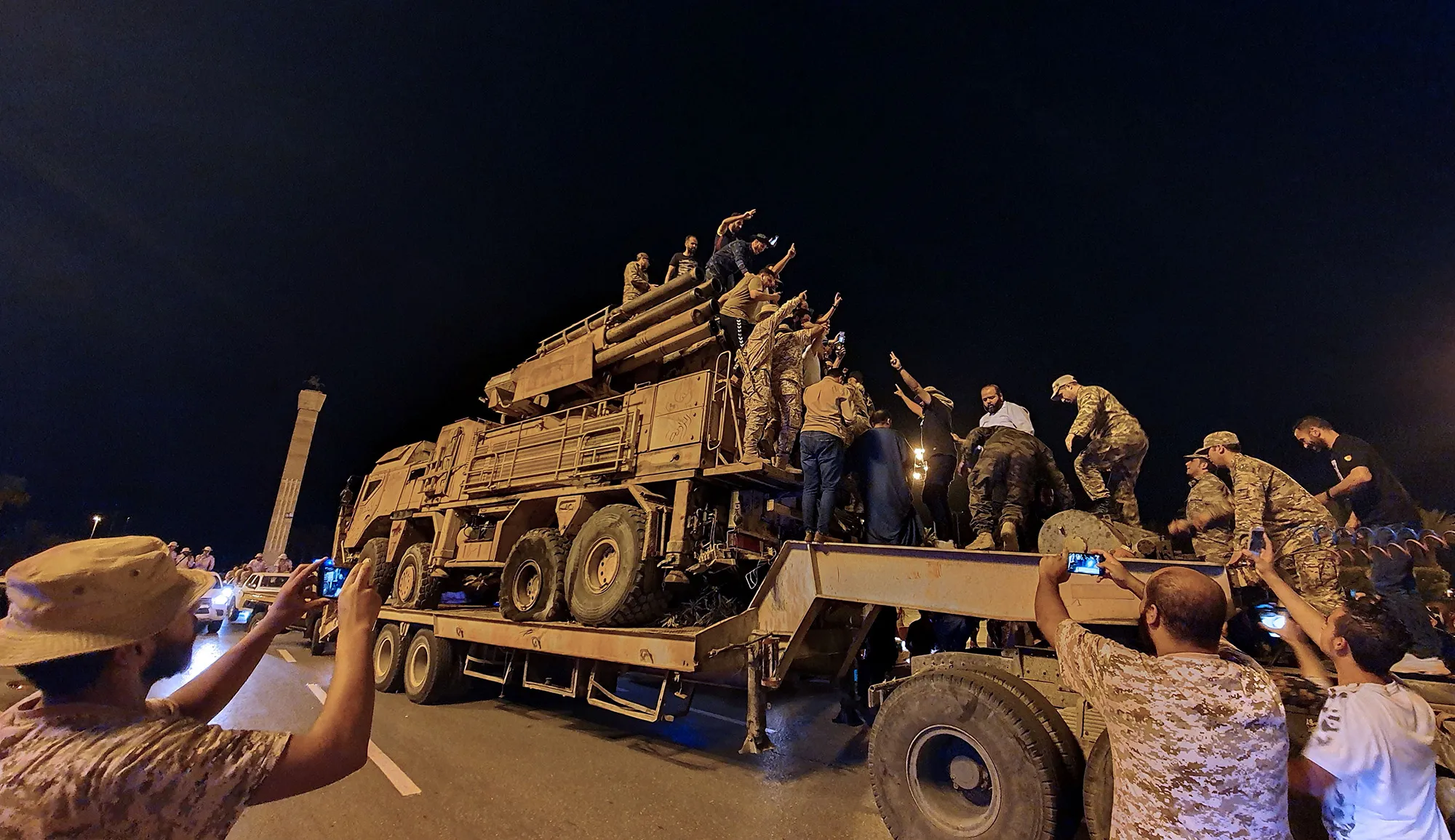 Forces loyal to Libya's&nbsp;Government of National Accord parade a Russian-made Pantsir air defense system truck in Tripoli on May 20.