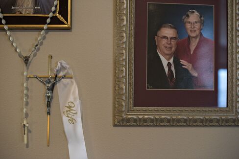 A portrait of Henry Rayhons and his late second wife Donna in the living room of Rayhons's condo.