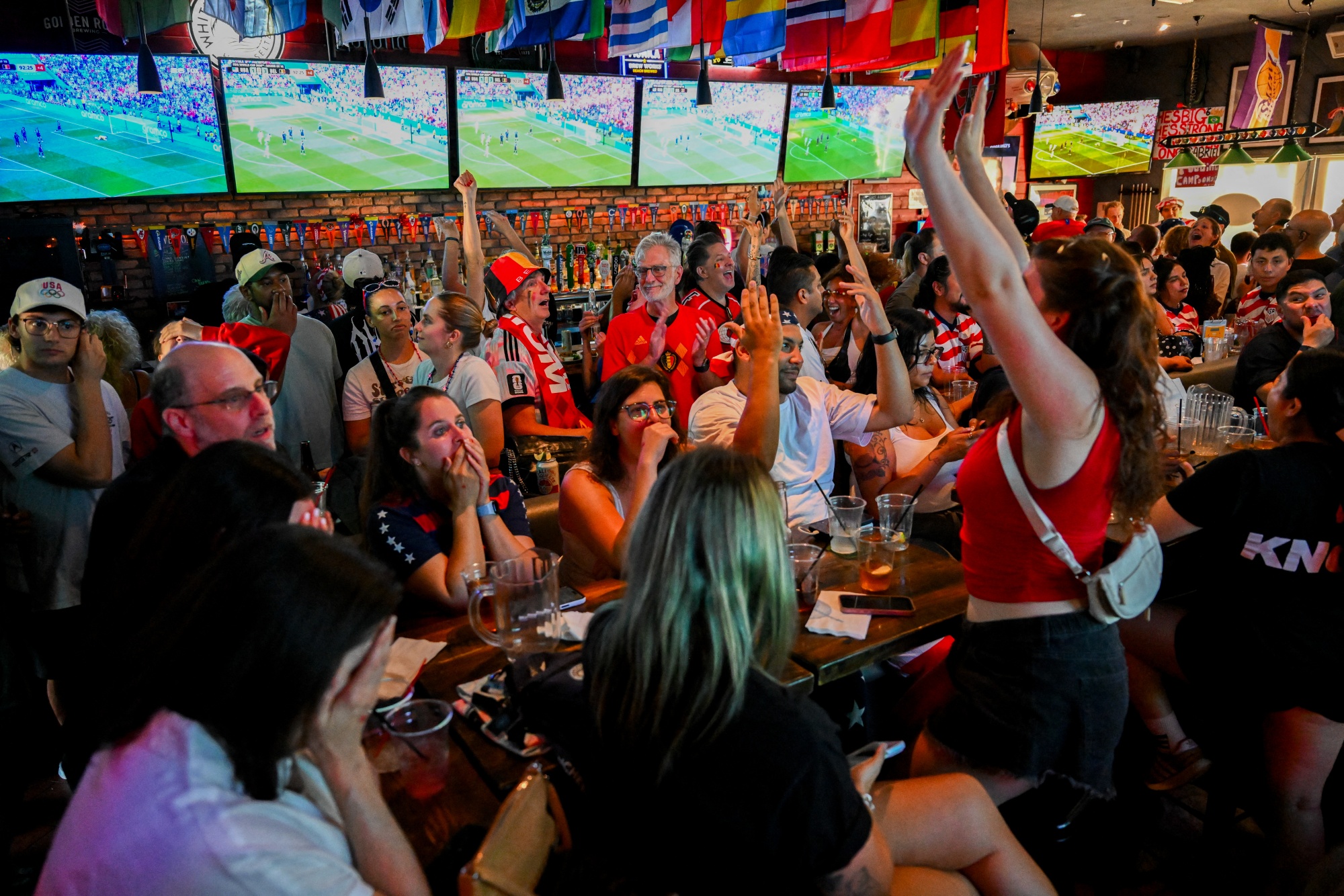 Fans watch the 2026 World Cup round of 16 match between USA and Belgium at Joxer Daly's in Culver City, California, on July 6. Photographer: Patrick T. Fallon/AFP/Getty Images