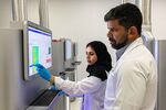 Ghareesa Al Mheiri, left, research specialist and Dr. Thyago Cardoso, research scientist at Biogenix Labs at Masdar City in Abu Dhabi, United Arab Emirates, July 1, 2025.  Photographer: Christopher Pike for Bloomberg Businessweek