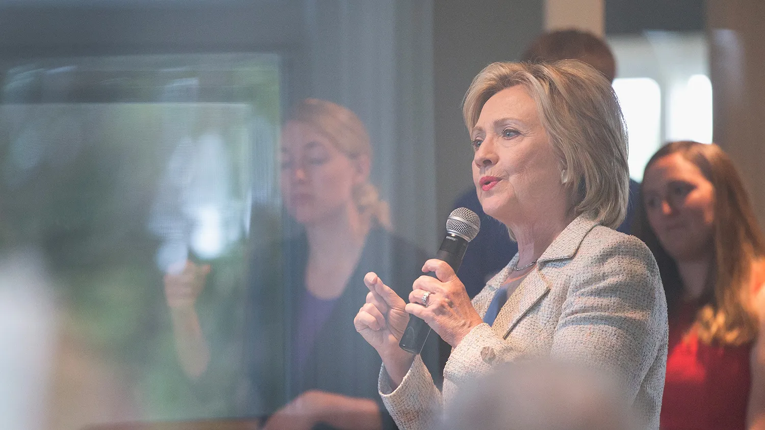 Democratic presidential hopeful and former Secretary of State Hillary Clinton speaks to guests gathered for a house party on July 26, 2015 in Carroll, Iowa.
