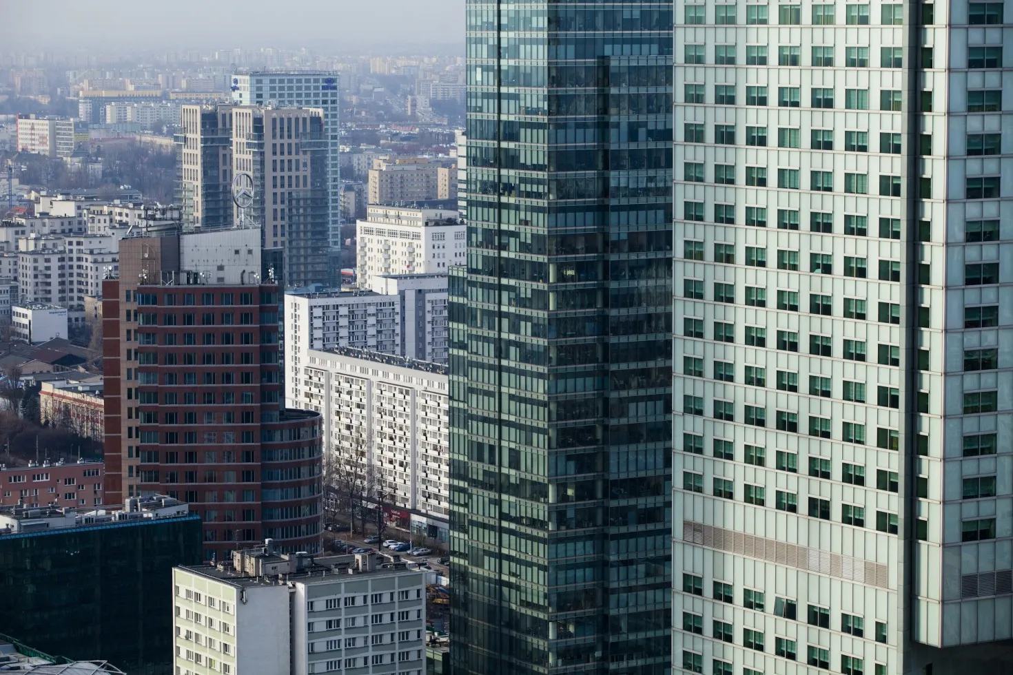 City skyscrapers are seen from the Palace of Culture and Science building on the skyline of Warsaw, Poland.