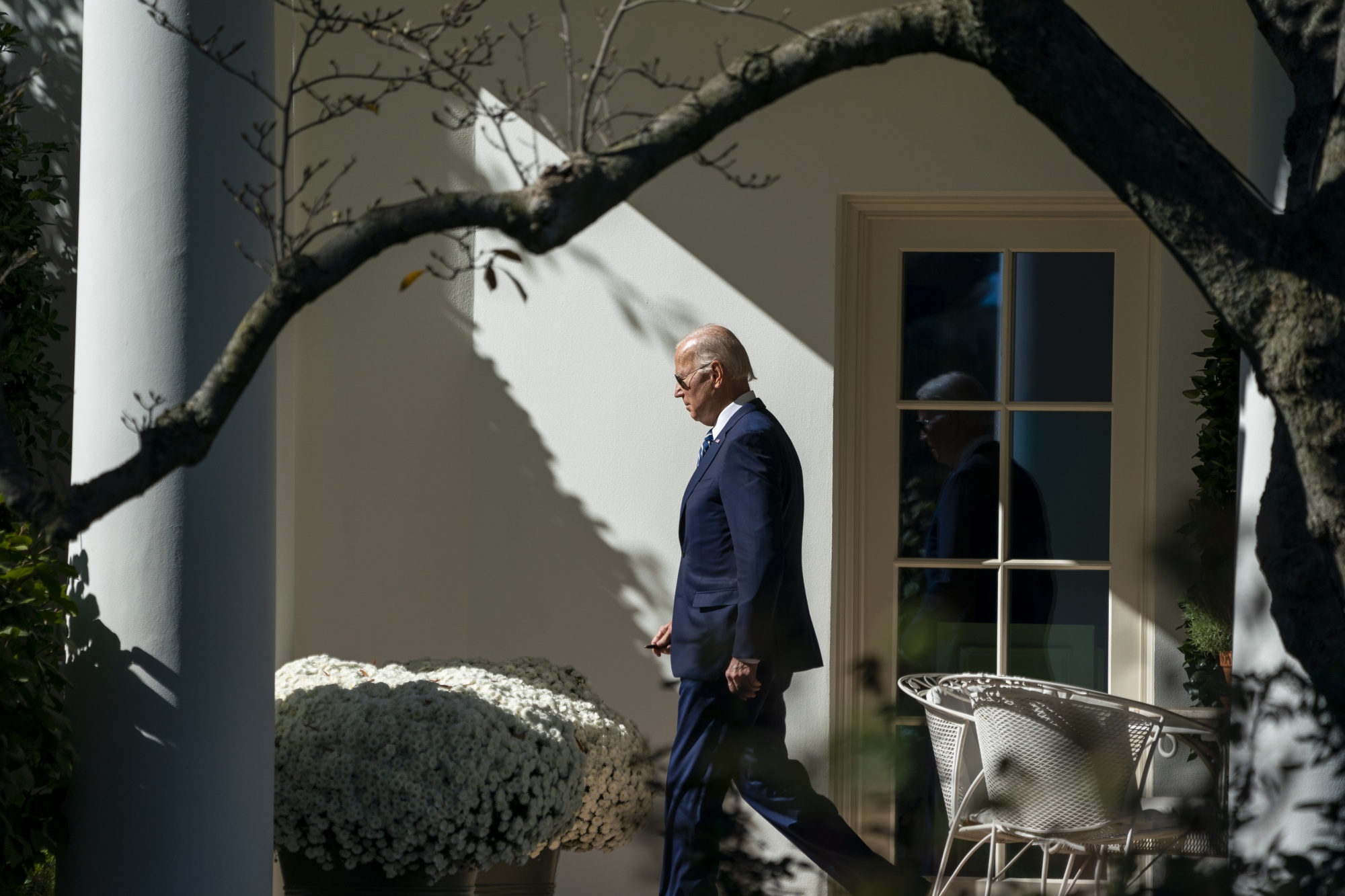 Joe Biden walks on the South Lawn of the White House&nbsp;in Washington, DC.