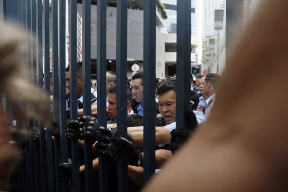 Hong Kong Protesters Swarm Police Building as Crisis Drags On