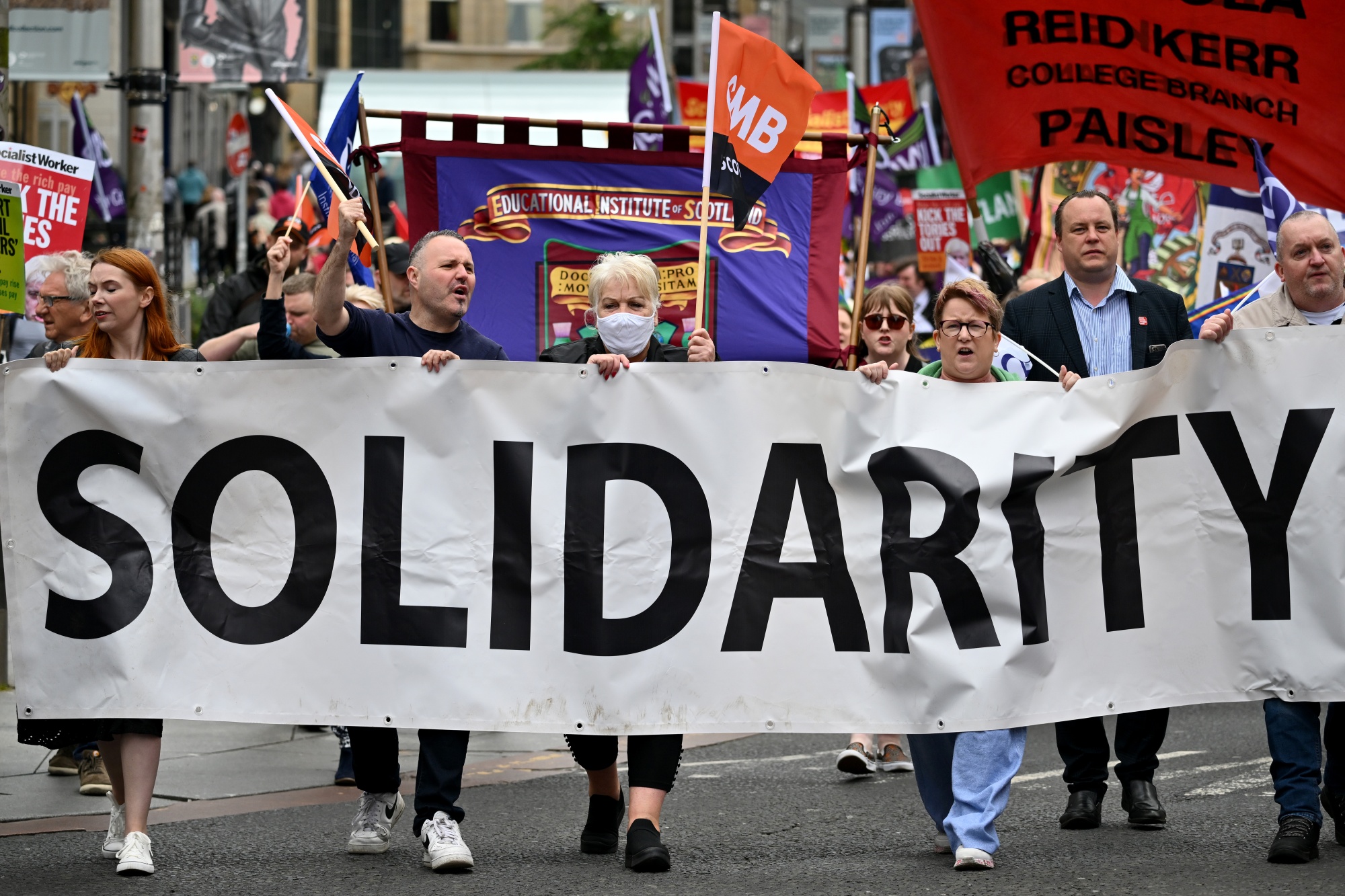 Labor Strikes in UK, US Workers Unite Against Inflation, Costof