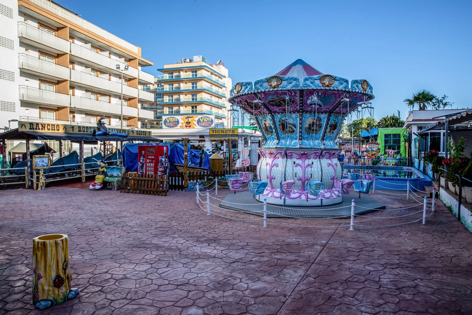 Children's amusement rides stand in a shuttered leisure park in Lloret de Mar, Spain, on May 19.