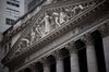 The New York Stock Exchange (NYSE) stands in New York, U.S., on Thursday, Dec. 31, 2015. U.S. stocks declined, with the Standard & Poor's 500 Index losing its grip on a fourth consecutive annual gain in the year's final trading session amid a slide in technology and consumer staples shares.