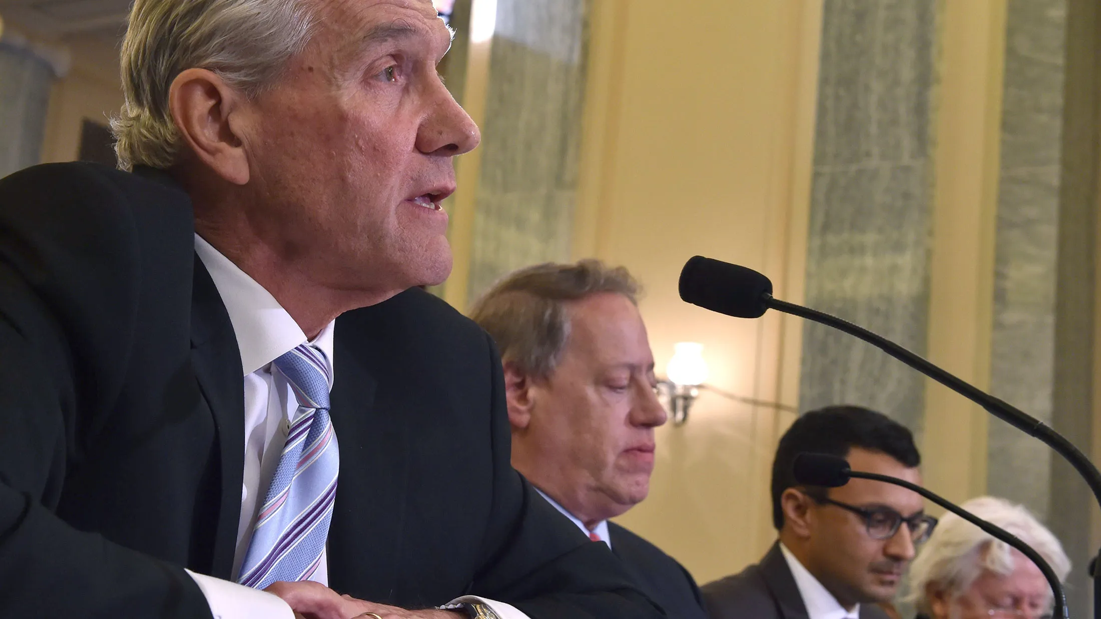 Dan Flynn, left, CEO and Secretary General of the US Soccer Federation, speaks during a Senate hearing entitled 'Examining the Governance and Integrity of International Soccer' on July 15, 2015 on Capitol Hill in Washington, DC.

