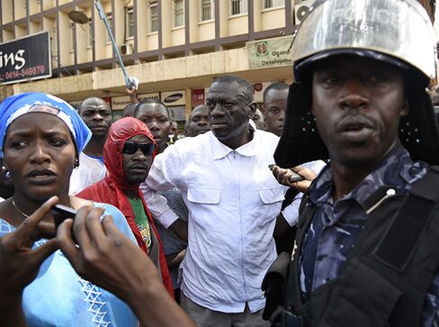 Kizza Besigye, center, in Kampala