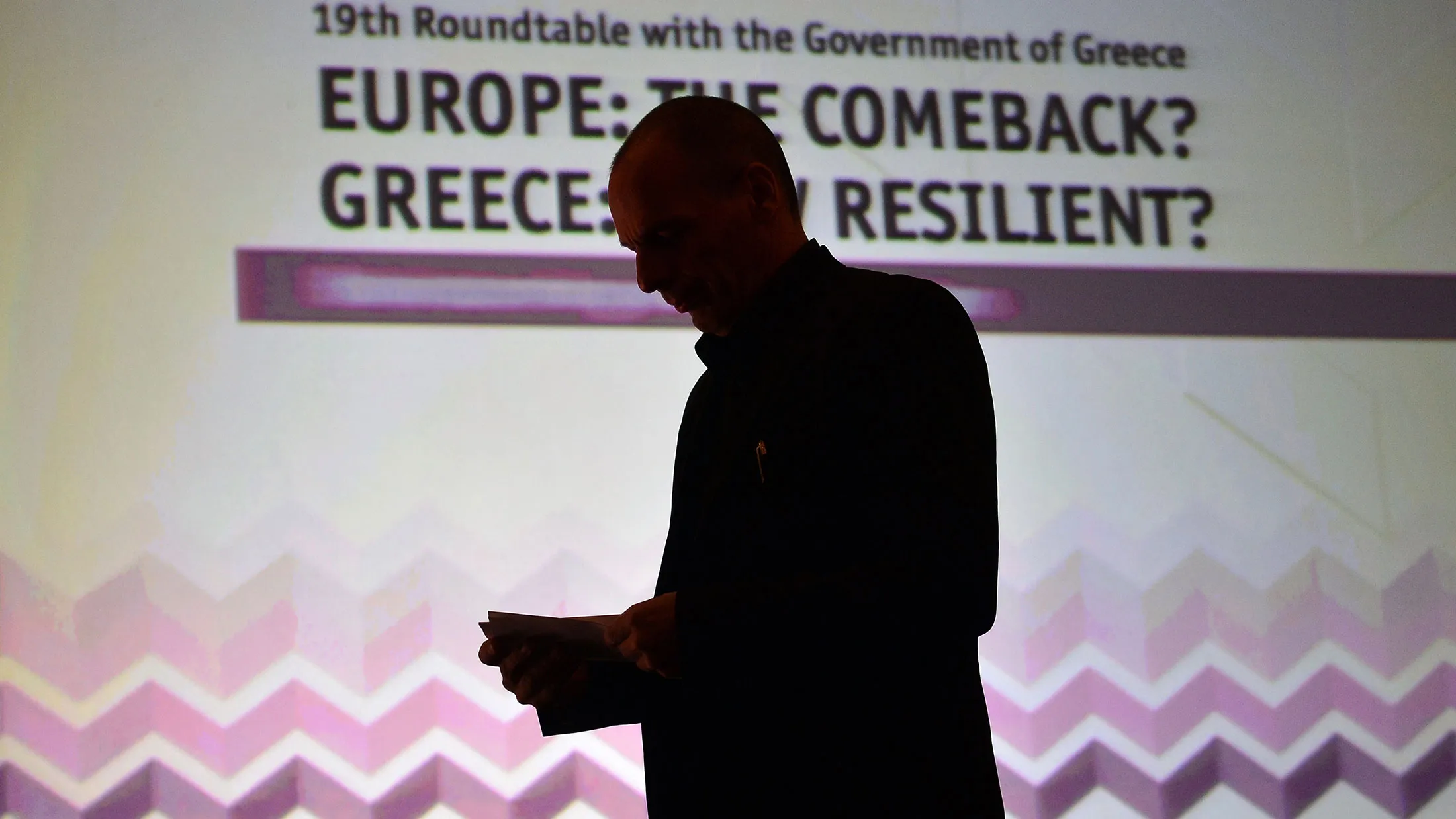 Greek finance minister Yianis Varoufakis stands prior to deliver a speech during the Economist conference entitled "Europe: The comeback ? Greece: How resilient?" on May 14, 2015 in Athens.
