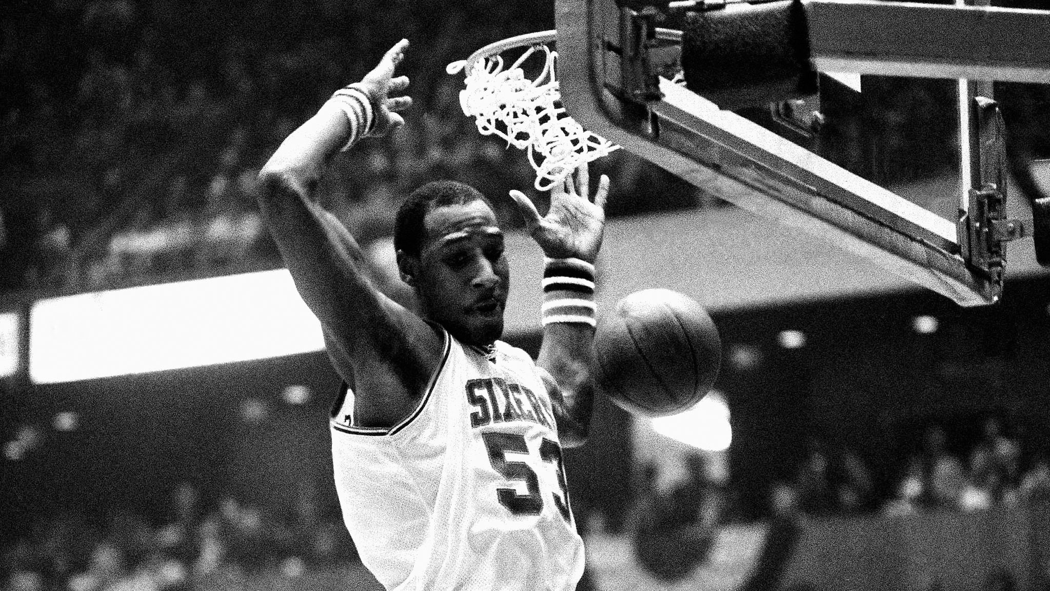 Sixers Darryl Dawkins hammers another dunk shot through the net to score against the Atlanta Hawks in an NBA playoff game, in this April 15, 1980 file photo, in Philadelphia.
