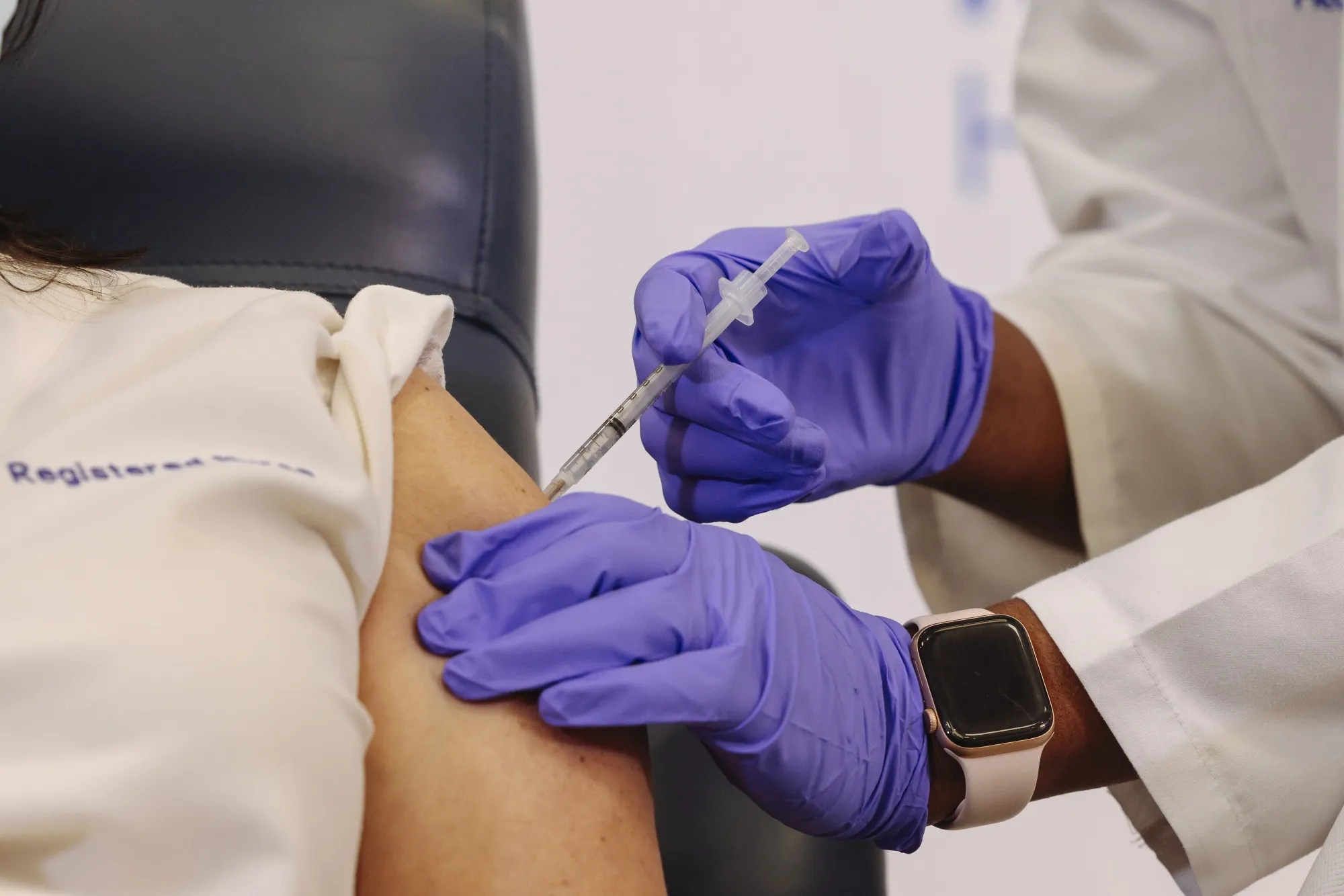 A healthcare worker receives the Pfizer-BioNTech Covid-19 vaccine in the Queens borough of New York, on&nbsp;Dec. 14.&nbsp;