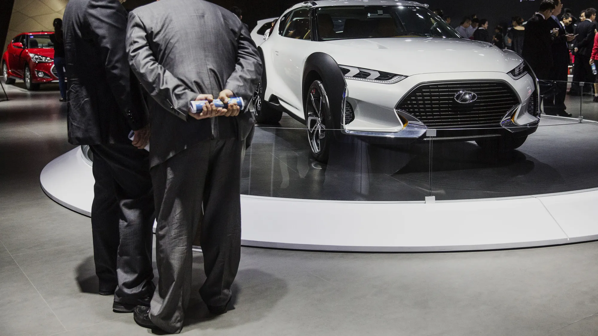 Attendees stand near the Hyundai Motor Co. Enduro concept vehicle on display during the China (Guangzhou) International Automobile Exhibition.
