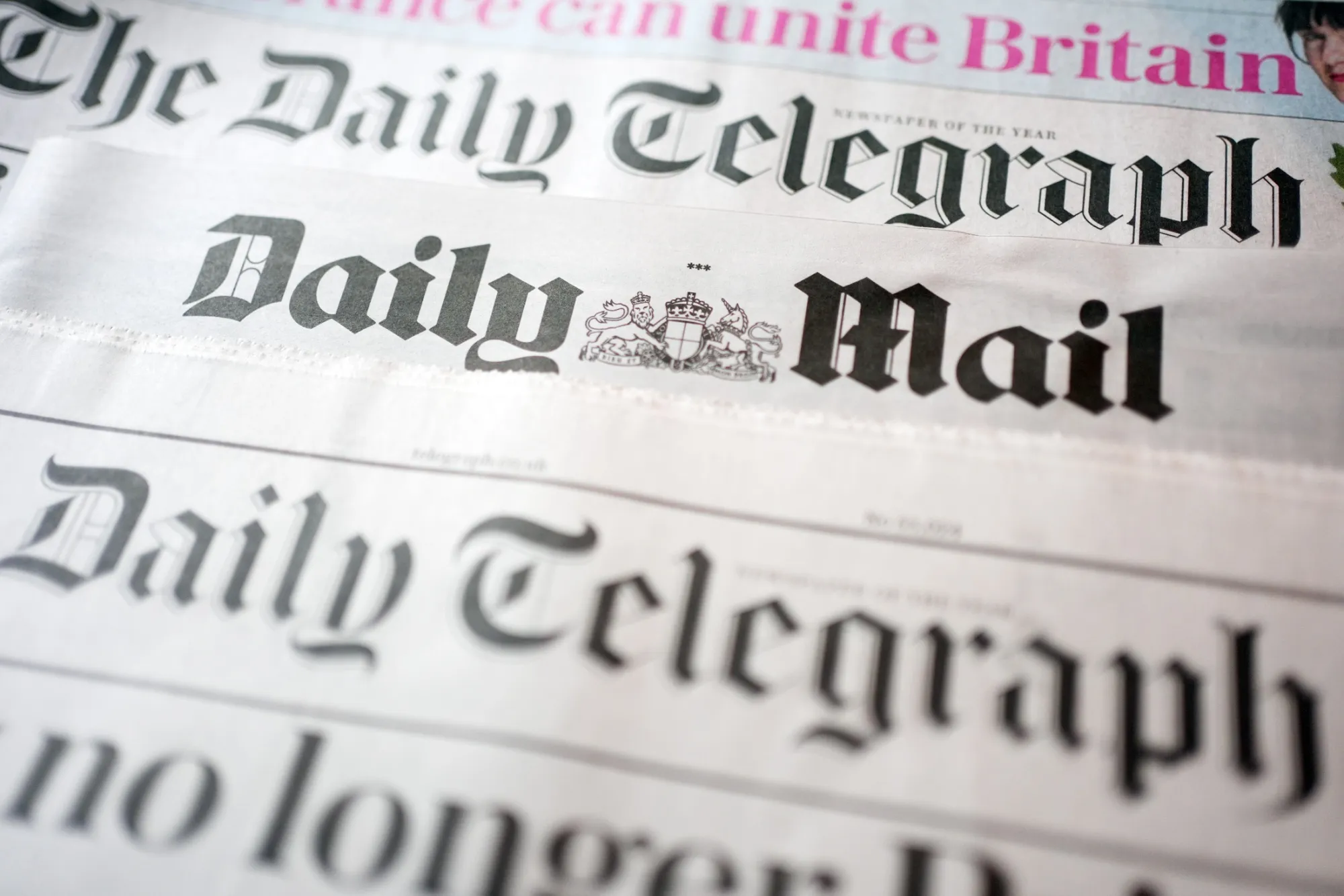 Mastheads of the Daily Mail and Daily Telegraph newspapers.
