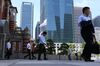 Morning Commuters Ahead of Japan GDP Figures Release