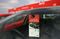 A satisfaction questionnaire hangs on the rear view mirror o