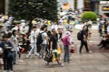 Shoppers in Nanjing Road As China Tourism Revenue More Than Doubled Over Holiday Weekend
