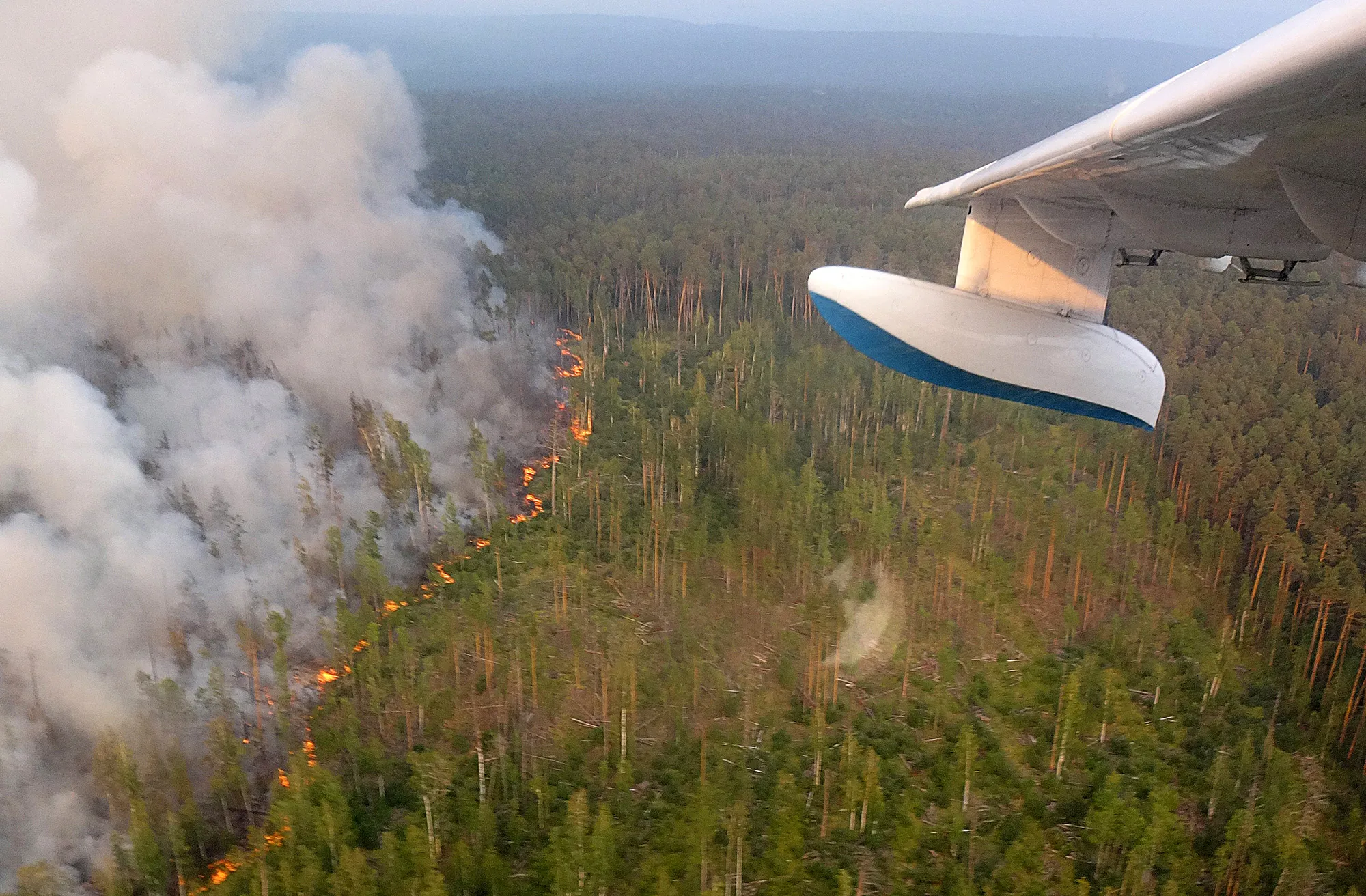 A wildfire seen from an amphibious aircraft in Siberia on July 28.