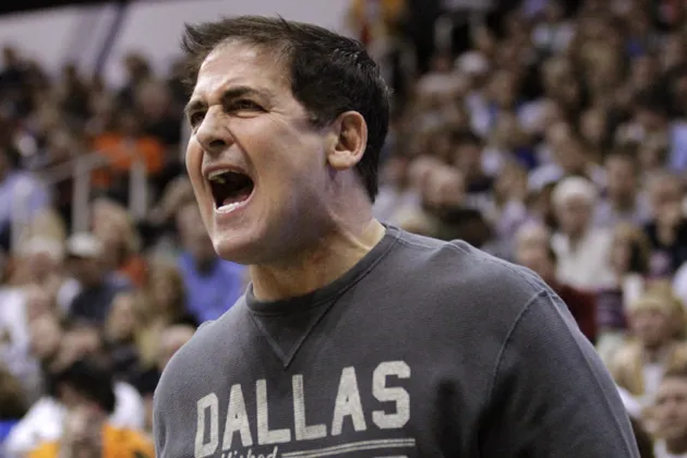 Dallas Mavericks owner Mark Cuban shouts during the Mavericks' NBA basketball game against the Utah Jazz on Oct. 31, 2012