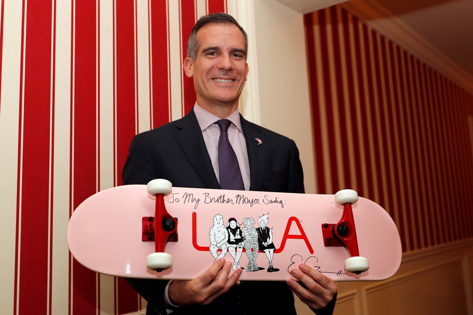 Best present ever? Los Angeles' Mayor Garcetti, with that skateboard.