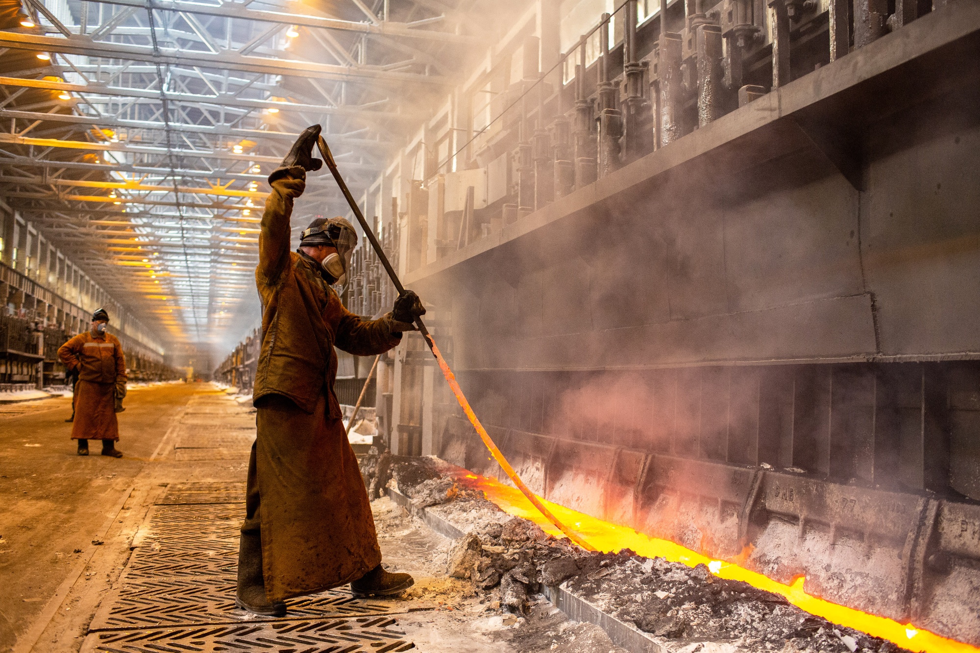 A worker in the electrolysis shop at the United Co. Rusal aluminum smelting plant in Shelekhov, Russia.