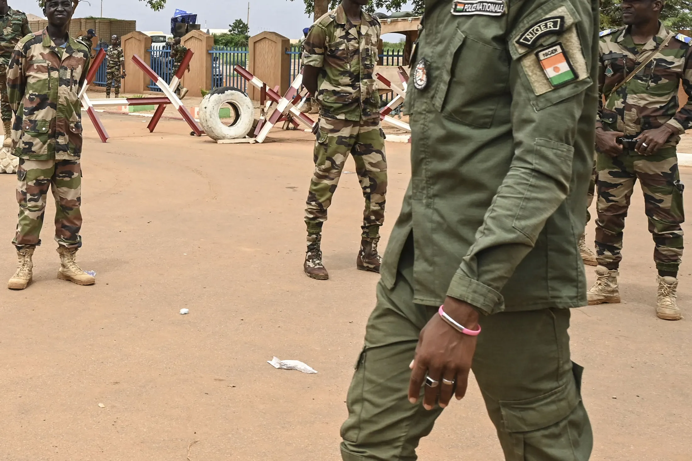 Nigerien soldiers stand guard during a demonstration in Niamey on Aug.&nbsp;11.