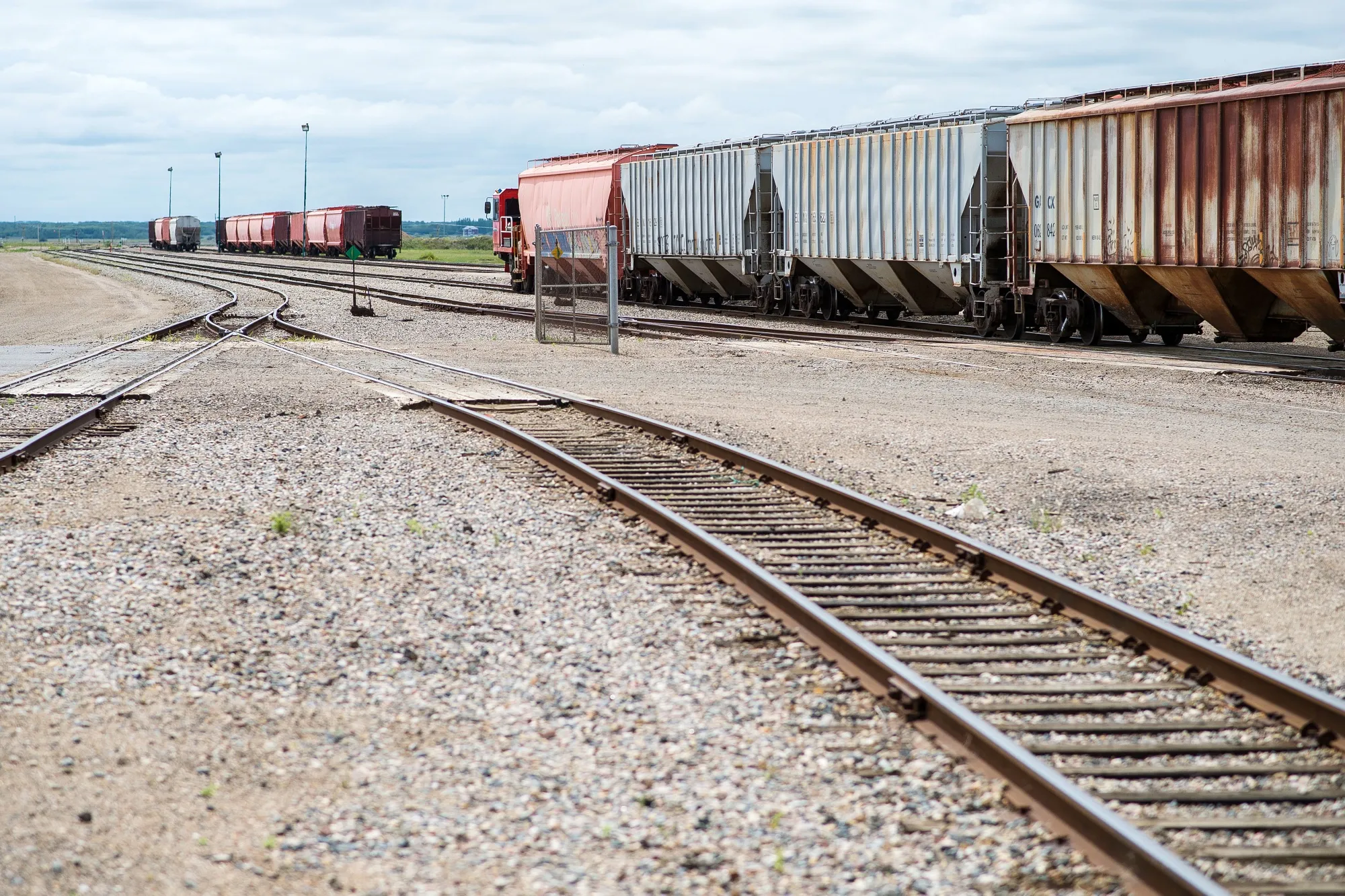 Rail cars sit on tracks at the Nutrien Ltd. Cory potash facility in Saskatoon.