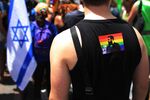 Israelis participate in the annual Gay Pride parade along the streets of Tel Aviv