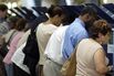 1470654072_160808_florida_voters_voting_booth_polling_place_station_getty