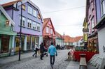 Multicolored buildings and retail stores in the old town district of Stavanger, Norway.